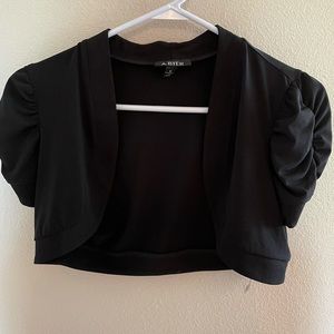 Black shrug
